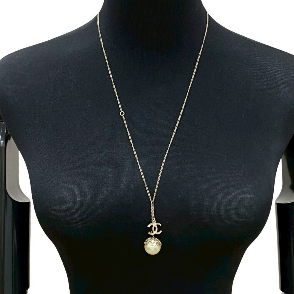 CHANEL Gold Pearl Logo Necklace